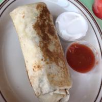Jerk Chicken Burrito · Wrapped In A 12” Flour Tortilla With Beans, Spanish Rice And Our 3 Cheese Blend (Jack, Chedd...