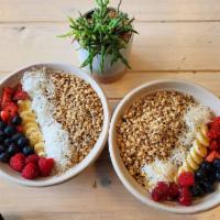Skinny Acai Bowl · Organic acai, almond milk, banana, strawberry, mango, granola, topped with banana, chia seed...