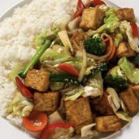 Tofu Teriyaki · Deep-fried tofu sautéed with vegetables (cabbage, carrots, onions, broccoli, red bell pepper...