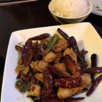 Hot and Spicy Chicken · Served with steamed rice. Spicy.