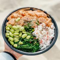 Spicy Ahi Bowl · Ahi tuna, creamy spicy sauce, green onion, tobiko, furakaki, seaweed salad, krab salad. Spicy.