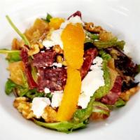 Beet Salad · Marinated beets, organic mix greens, goat cheese, orange segments, caramelized toasted walnu...
