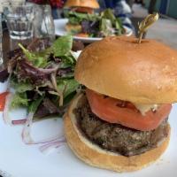 Surf Burger · Grass-fed beef, tomatoes, pickles, caramelized onions, mayo-lemon dijon mustard
Add cheese $...