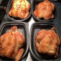 Rotisserie Chicken · All natural 3.5 pound chicken. Served with cornbread and coleslaw. Don't forget to add sides!