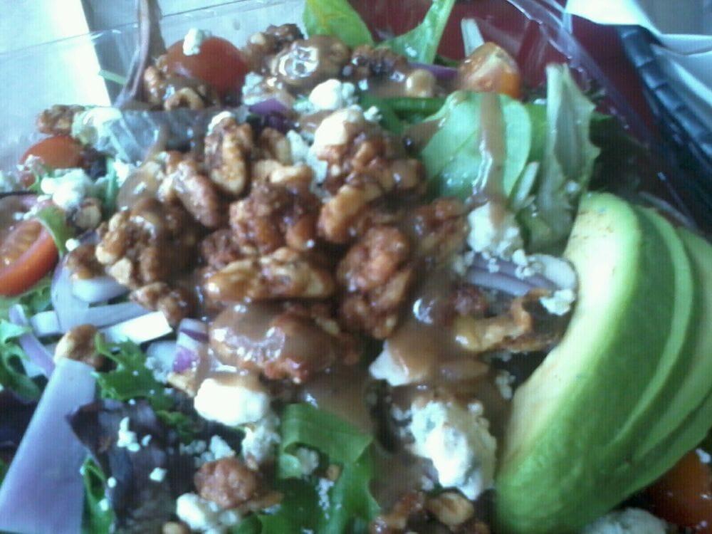 Bistro Salad · Assorted field greens, chopped tomato, crumbled blue cheese and glazed walnuts. Choice of dressing on the side.