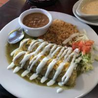 Chile Verde Enchiladas · 2 tortillas stuffed with shredded chicken, topped with homemade verde sauce, shredded cheese...