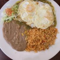 Cheese Enchiladas · 2 corn tortillas stuffed with shredded cheese topped with homemade verde sauce and sour crea...