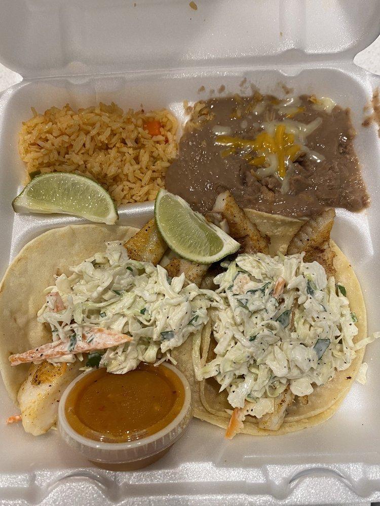 Fish Tacos · Grilled or breaded tilapia topped with coleslaw on corn or flour tortillas. Served with rice and refried beans.