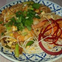 Pad Thai · Stir-fried rice noodles tossed with shrimp, egg, tofu, bean sprout, and topped with chopped ...