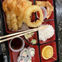 Shrimp Tempura · Crispy tempura battered deep-fried shrimp with tempura dipping sauce.