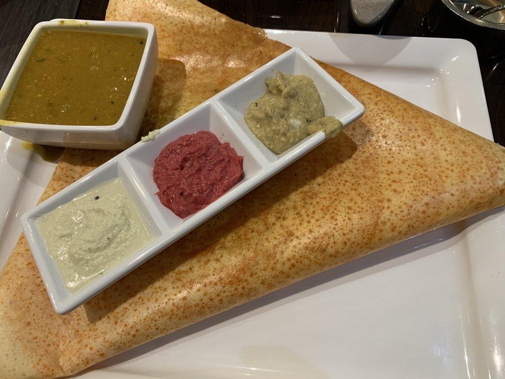 Mysore Masala Dosai · Classic South Indian thin crepe made of rice and lentil spread with spicy house chutney and filled with seasoned potato masala.