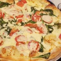 Spinach and Tomato Pizza · 