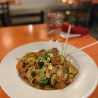Pad Khi Mao · Drunken noodle. Flat rice noodle stir-fried with vegetables, basil in chili and garlic sauce...
