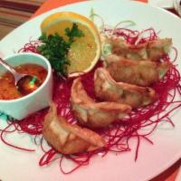 Dumplings · Mixed scallop, pork and shrimp combination. Potstickers.
