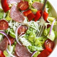 Italian Salad · Chopped romaine, bell peppers, salami, mozzarella, Kalamata olives, tomatoes, artichoke hear...