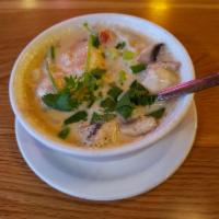 Tom Kha · Coconut milk soup, mushroom, onion, cilantro and Thai herbs. 