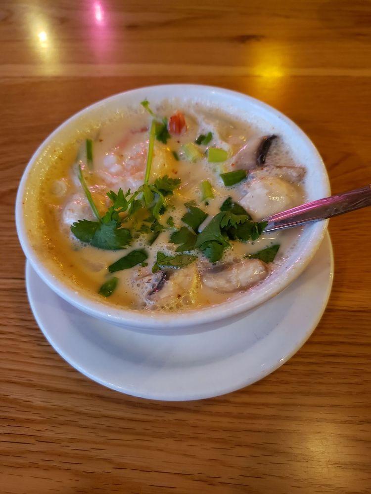 Tom Kha · Coconut milk soup, mushroom, onion, cilantro and Thai herbs. 