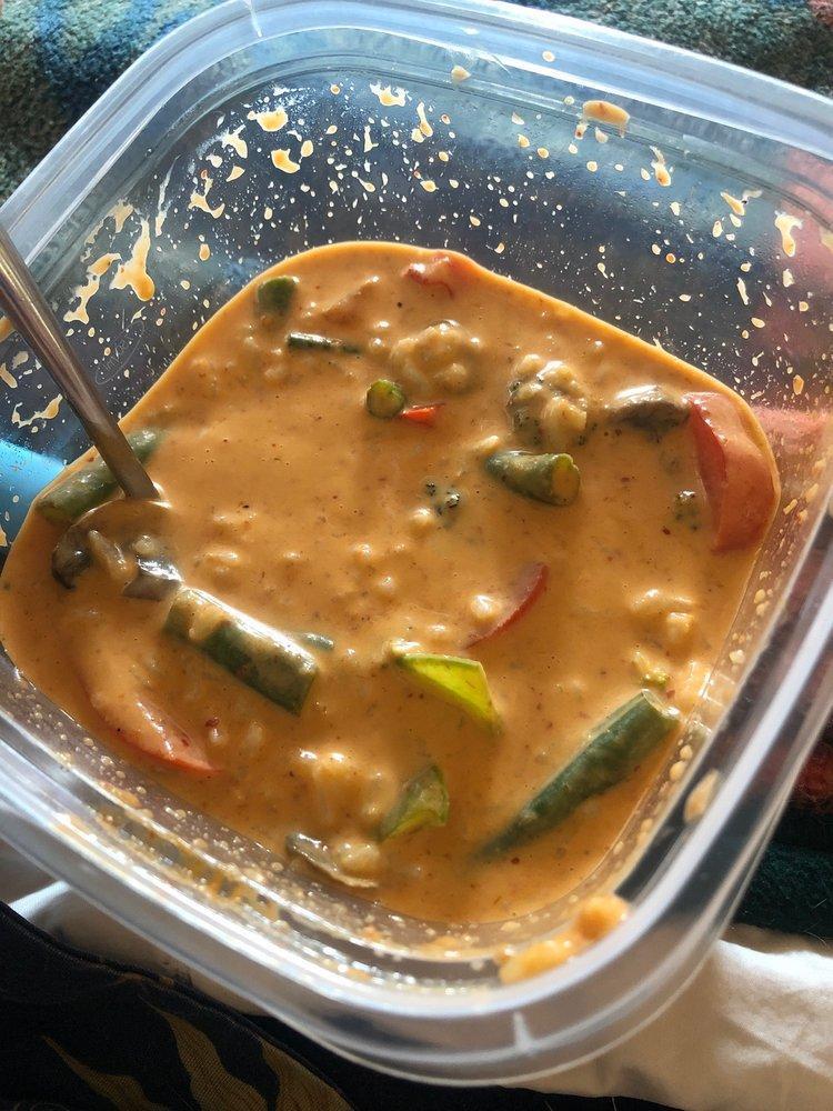 Jungle Curry · Mixed veggies: snow pea, broccoli, red bell pepper, green bean and white mushroom in red curry sauce. Served with jasmine rice. Vegetarian.