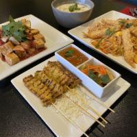 4 Chicken Satay · Grilled strips of chicken marinated with a Thai spices and herbs, served with peanut sauce a...