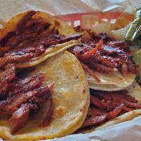 Trompo Taco · Best TROMPO tacos in Dallas, served with onion and cilantro.