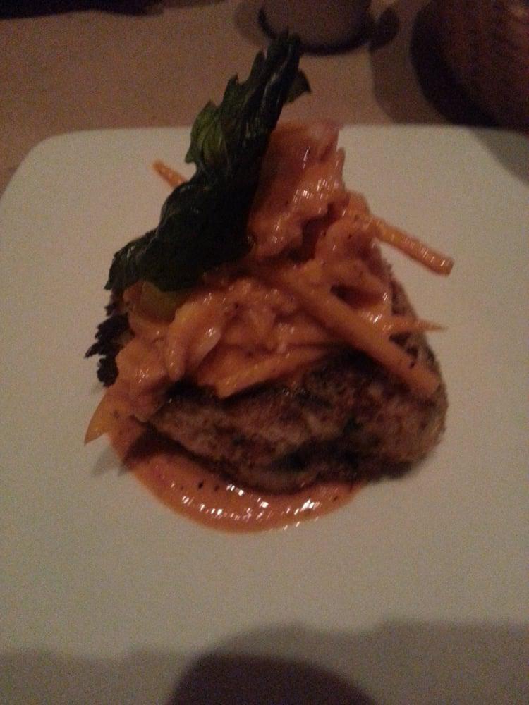 River Boat Crab Cakes · Twin crab cakes served over rice and topped with a white wine - caper - tomato - shrimp sauce. 
