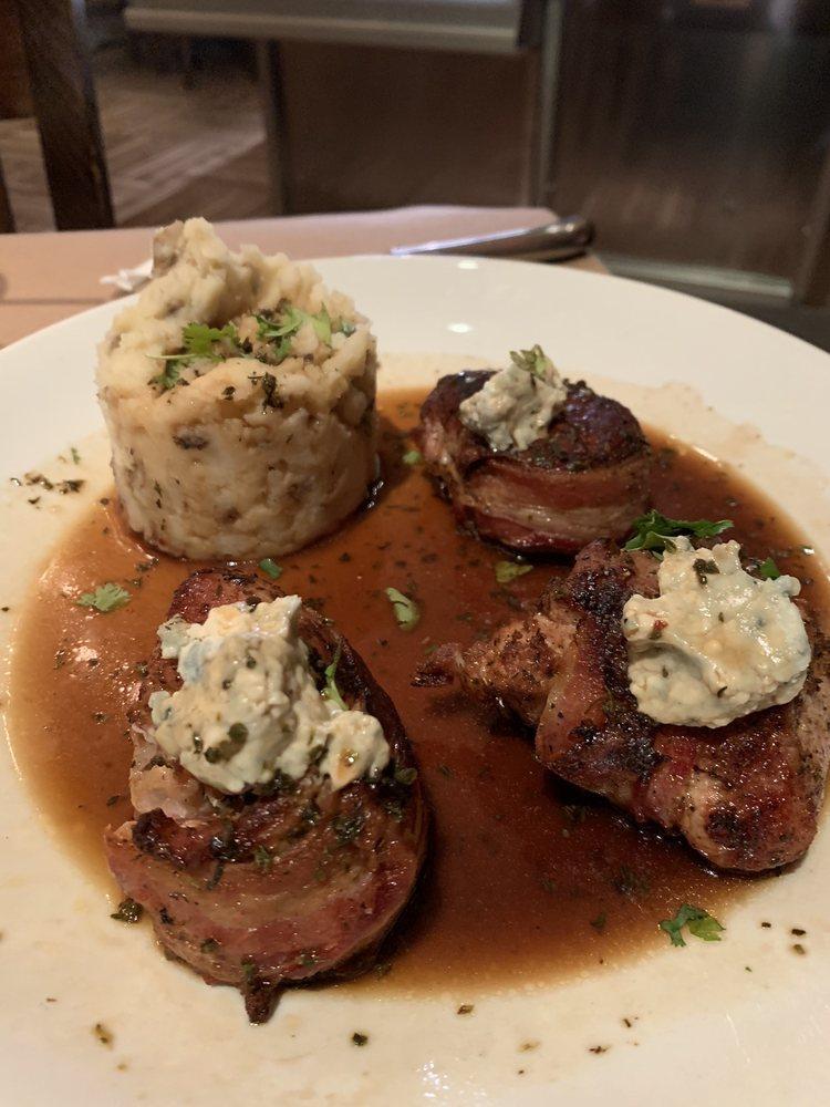 Elba Blues ·  For you Napoleon…. Pan fried medallions of pork tenderloin wrapped with bacon and melted blue cheese Au gratin over porcini mushroom sauce. Accompanied by mashed potatoes.