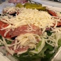 Antipasto Salad · Pepperoni, salami, ham, mozzarella, black olives, red onion, pepperoncini, tomato on a bed o...