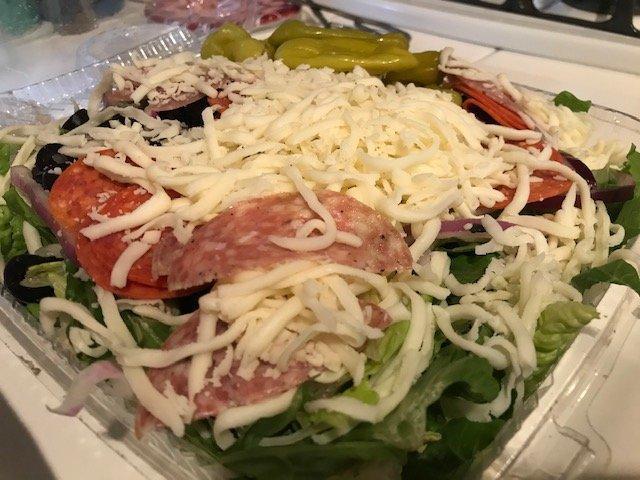 Antipasto Salad · Pepperoni, salami, ham, mozzarella, black olives, red onion, pepperoncini, tomato on a bed of crisp romaine lettuce.