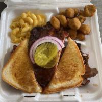3 Meats Plate · Choice of 3 proteins, 2 sides and Texas toast.