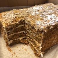 Russian Honey Cake · Caramelized honey cake with walnuts layered with dolce de leche sourcream whipped cream.