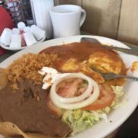 Huevos Rancheros · Three fried eggs with salsa, rice and beans. Served with rice, beans, and salad.