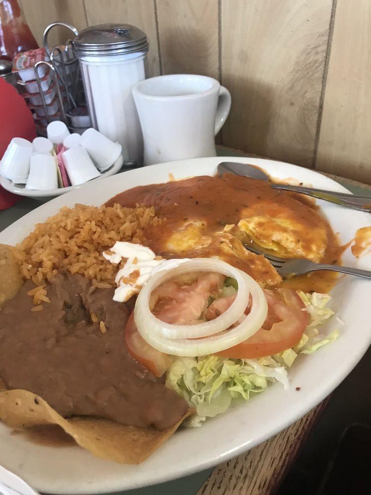 Huevos Rancheros · Three fried eggs with salsa, rice and beans. Served with rice, beans, and salad.