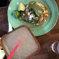 Ceviche · Steamed fish or shrimp with onion jalapenos cilantro tomatoes and spices cooked in fresh lim...
