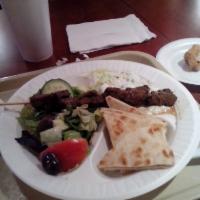 Greek Platter · Fresh Greek salad, cucumber sauce, grilled Grecian pita, and choice of kabobs. You can order...