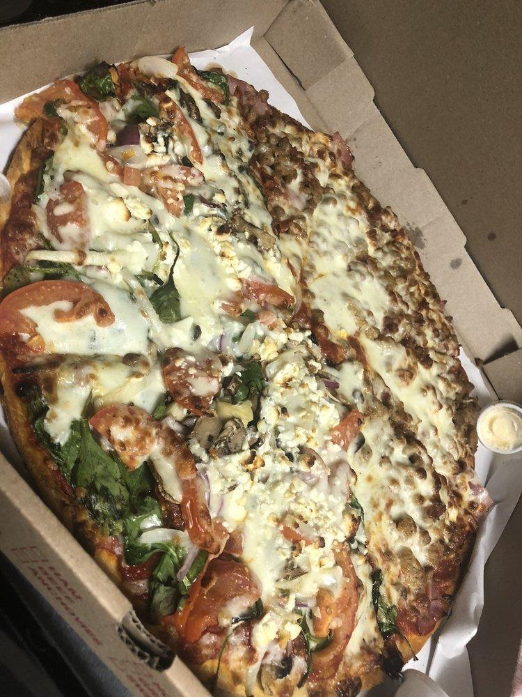 Healthy Heart Pizza · Olive oil base, oregano, basil, spinach, onion, mushroom, artichoke, fresh and sun-dried tomato, roasted garlic, feta and mozzarella.