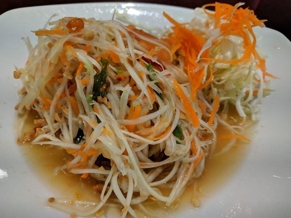 Papaya Salad · Fresh raw papaya, tomato, long bean, Thai chili, crusted peanut, and dried shrimp. Spicy. Vegetarian. If you find more, please order from Side Dishes menu.