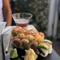 Totowa Roll · Spicy tuna, shrimp, and avocado wrapped in soy paper topped with salmon and spicy mayonnaise.