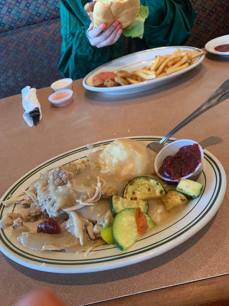 Turkey Dinner · Daily baked bird, a mixture of white and dark meat, placed over stuffing and topped with rich turkey gravy. Cranberry sauce served on the side.