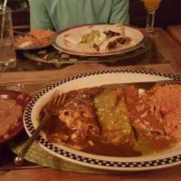 Enchiladas Tres Amigos · Beef, chicken, cheese enchiladas each topped with red tomato sauce, green
tomatillo sauce, a...