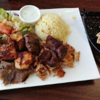 City Mix · It is served with chicken and lamb shish, chicken gyro, lamb-beef gyro, and kofte. And it co...