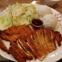 Chicken Katsu · Panko breaded chicken breast, steamed rice, and salad. Comes with traditional Japanese katsu...