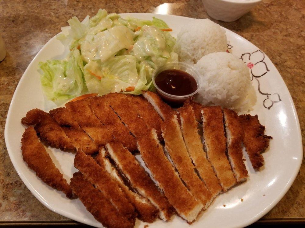 Chicken Katsu · Panko breaded chicken breast, steamed rice, and salad. Comes with traditional Japanese katsu sauce on the side.
