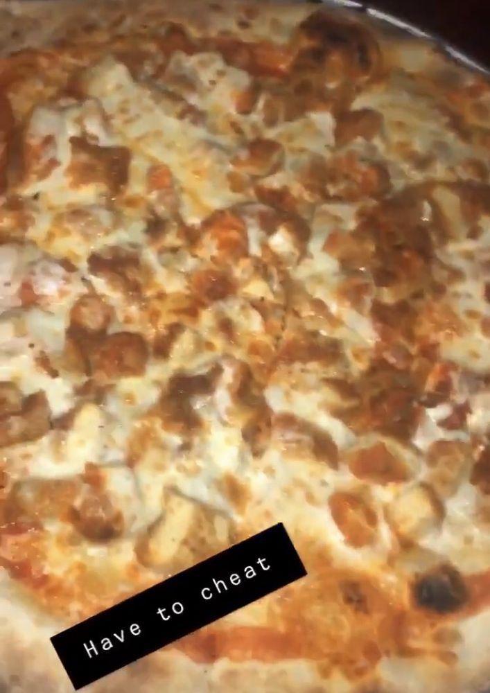 Buffalo Chicken Pizza · Breaded chicken in a spicy Buffalo sauce and shredded mozzarella drizzled with ranch dressing and topped with parsley.