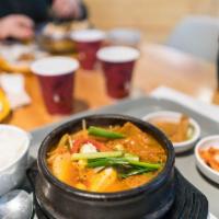 Kimchi Chigae · Pork, tofu, and kimchi soup.