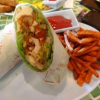 BBQ Chicken Wrap · Grilled chicken breast, romaine lettuce, tomatoes, onion rings and BBQ sauce, wrapped in a s...
