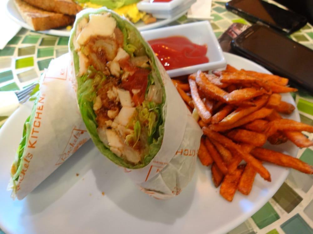 BBQ Chicken Wrap · Grilled chicken breast, romaine lettuce, tomatoes, onion rings and BBQ sauce, wrapped in a spinach tortilla.