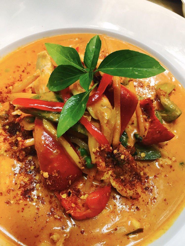Red Curry · Red curry and coconut milk with bamboo shoots, bell pepper basil leaves and sweet peas.