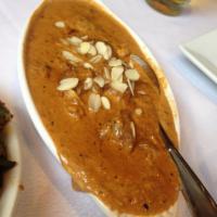 Lamb Korma · Lamb cooked in mildly spiced cream sauce with nuts.