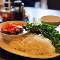 Bun Cha Ha Noi · Grilled pork patty & sliced pork with vermicelli noodle, lettuce, mint and cilantro.