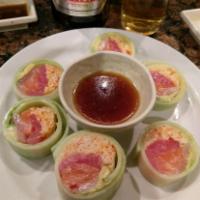Sexy Roll · Spicy crabmeat, avocado, tuna, salmon, yellowtail and wrapped in cucumber with garlic ponzu....